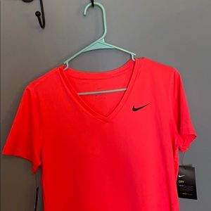 Brand new pink nike shirt. Still with tags